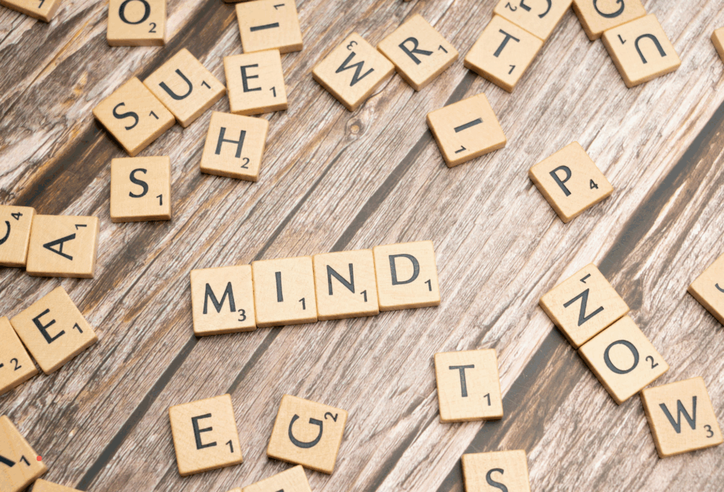 wooden letter tiles spelling “mind” as a symbol of mental clarity