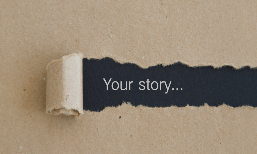 torn paper revealing the words “Your story” as a symbol of personal narrative