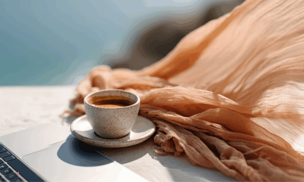 Coffee cup resting on a table during a calm journaling and reflective writing moment