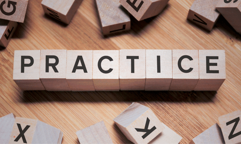 Wooden letter blocks spelling practice as a symbol of building a consistent writing routine