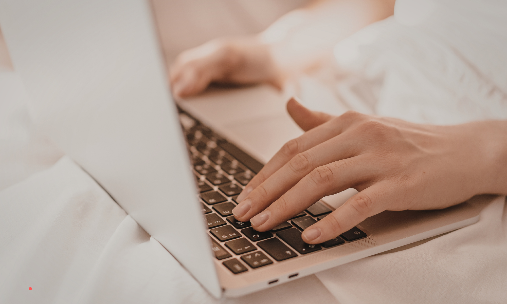 Writing a healing story about unspoken emotions on a laptop in a quiet and reflective moment.