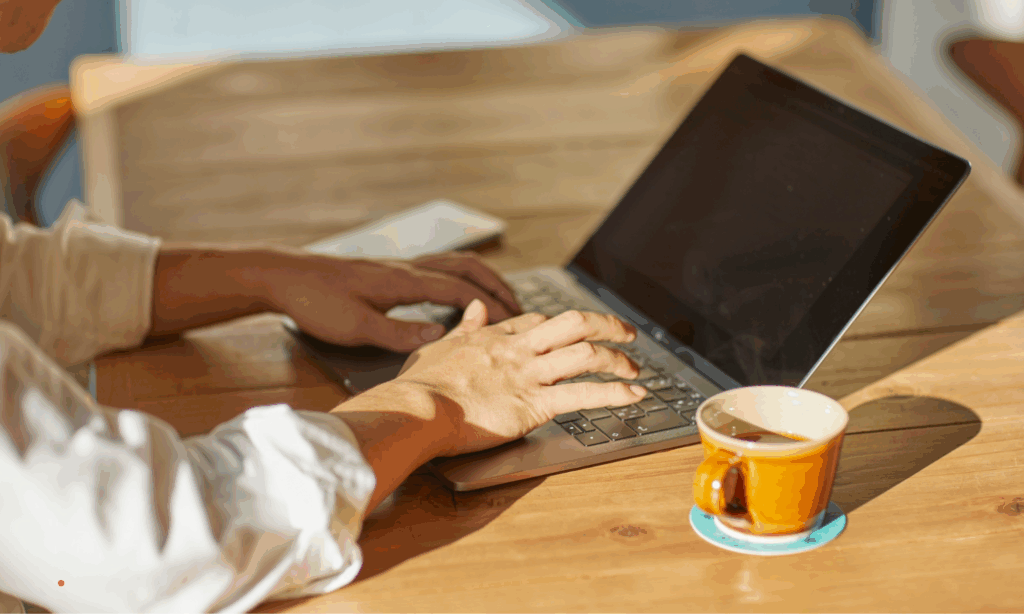 writing a personal story on laptop in a calm and focused workspace