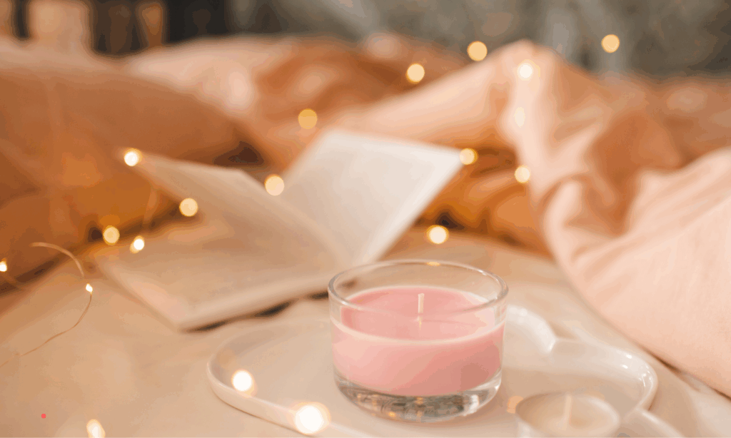 cozy journaling moment with candle and soft lights for emotional writing
